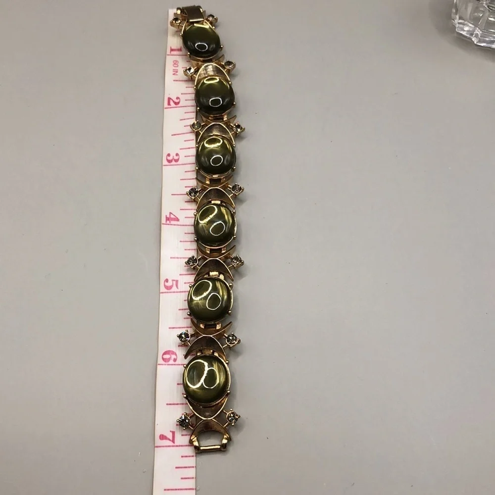 Vintage bejeweled elegant statement costume bracelet.